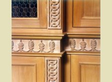 Detail of Hallidays' hand carving on bookcase